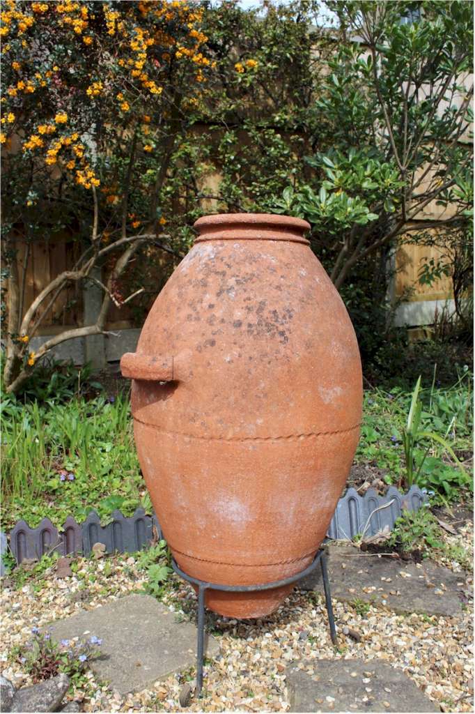 Large terracotta olive oil garden urn