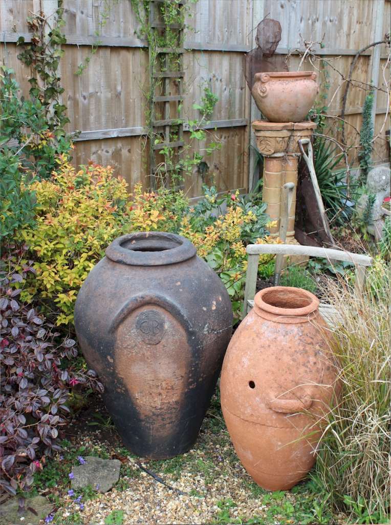 Large antique European olive terracotta garden urn measuring 84 cm high x 55 cm diam.