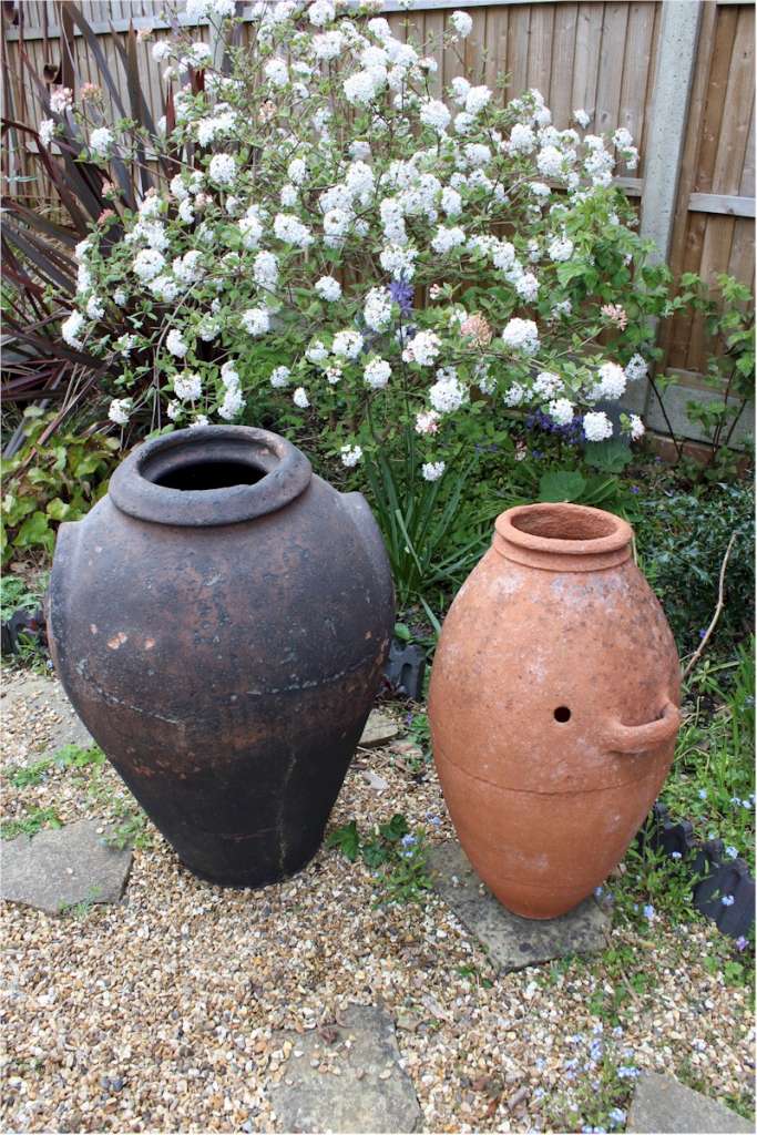 Large antique European olive terracotta garden urn measuring 84 cm high x 55 cm diam.