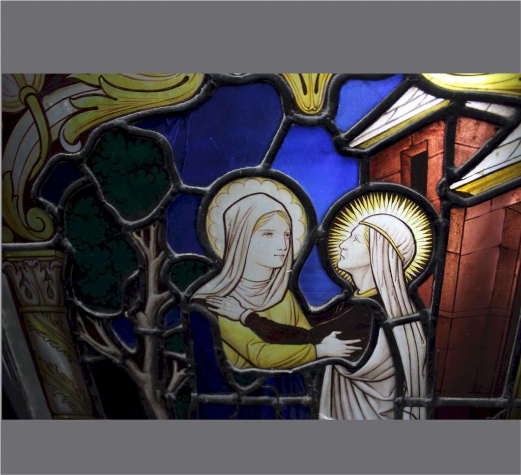 Religious stained glass with two female figures