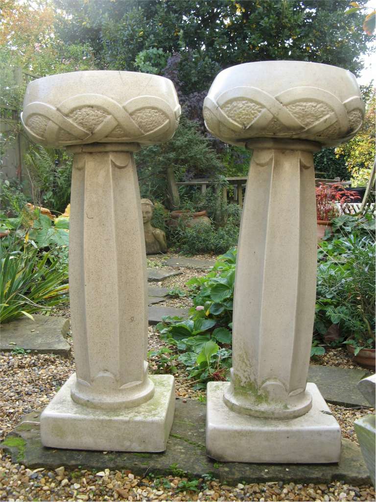 Pair of Arts and Crafts LEFco Ware jardinières and stands