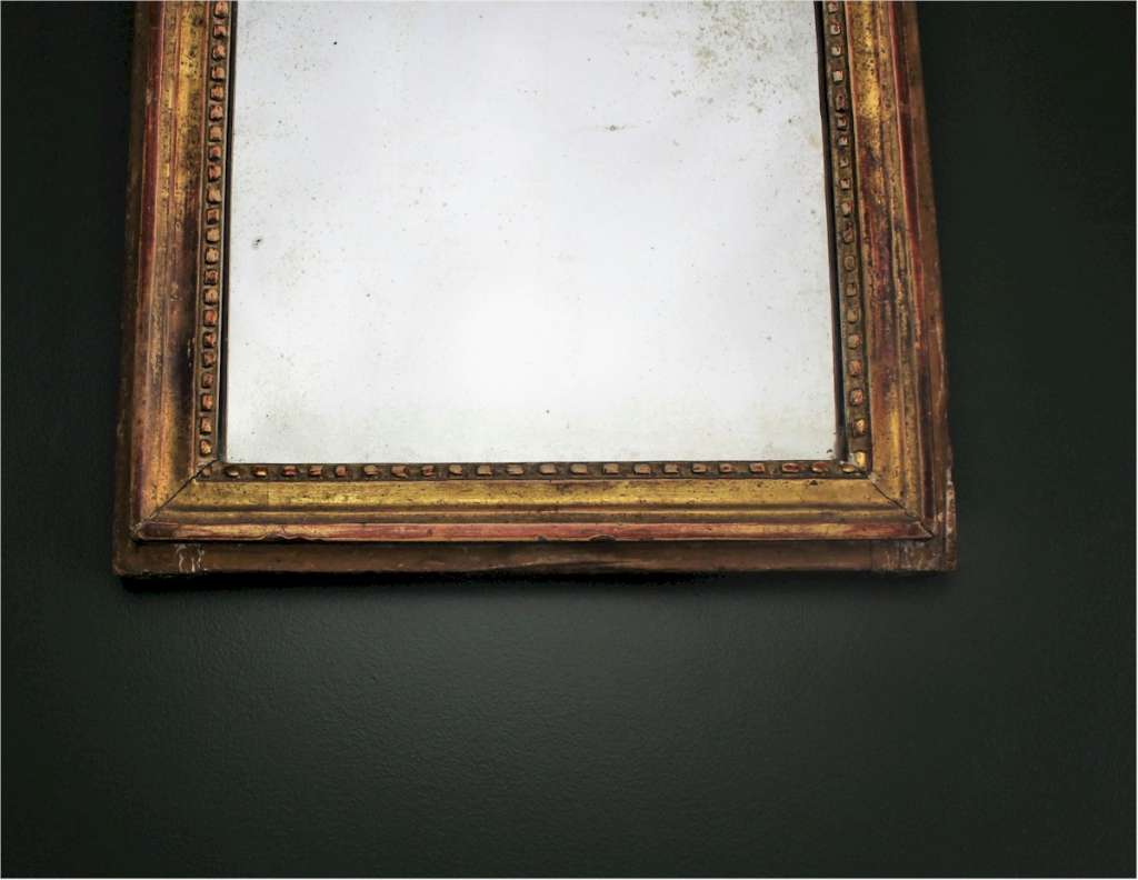 Antique gilt wall mirror