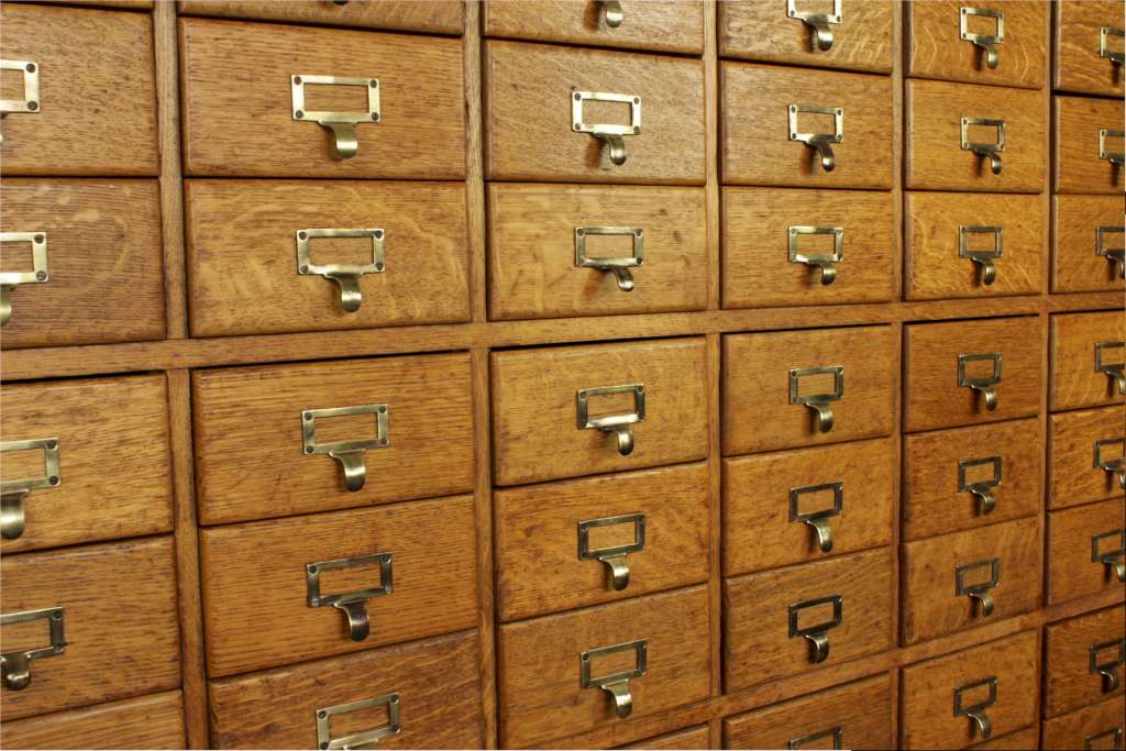 Vintage shop fitting / filing in solid oak with 63 drawers