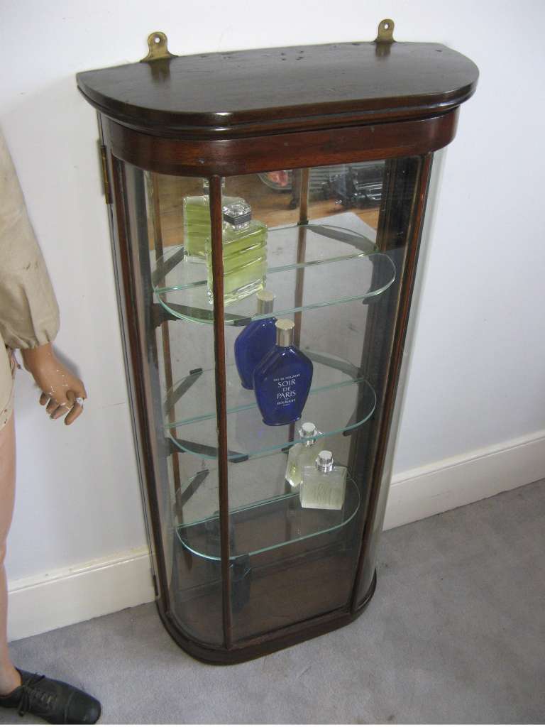 Victorian bow fonted mahogany shop display cabinet