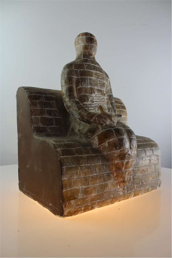 Geraldine Knight (1933-2008) Figure with bird seated on a bench