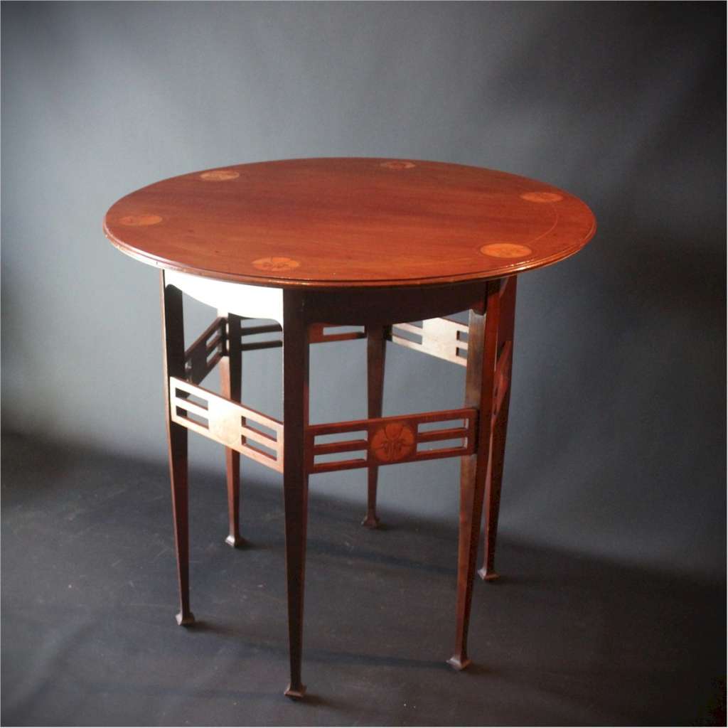 Art Nouveau mahogany centre table by JS Henry