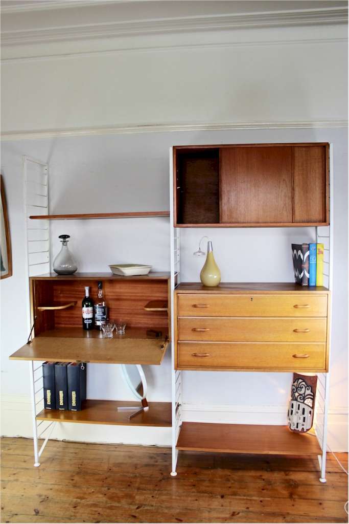 Ladderax shelving system by Staples with white ladders MidCentury