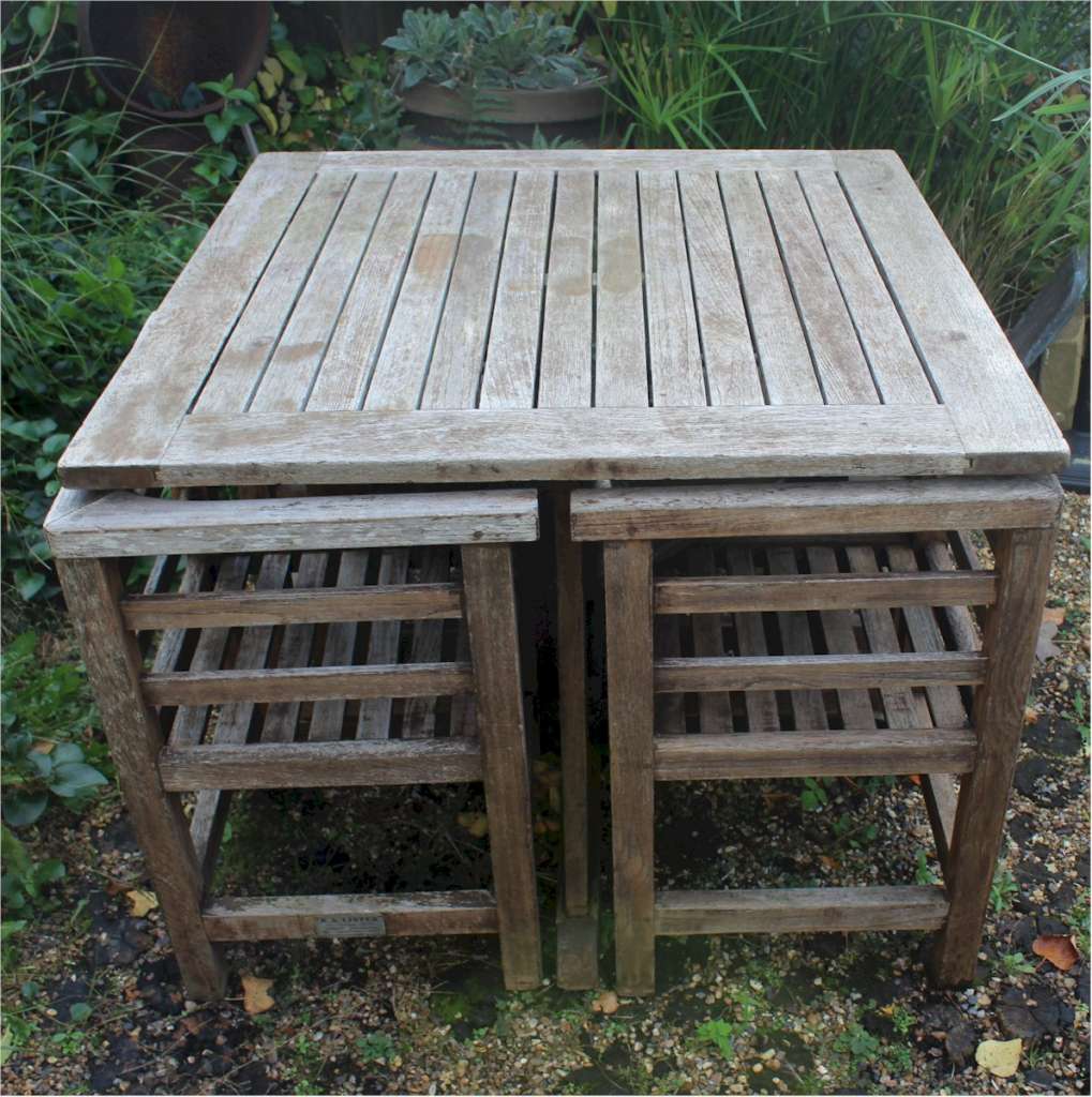 Teak table and chairs by RA Lister