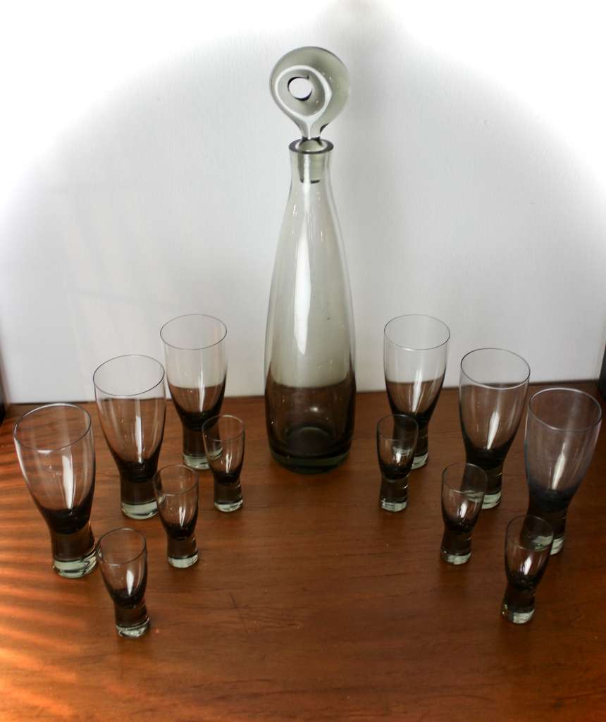 Per Lutken smoky grey glass Aristocrat decanter and twelve glasses.