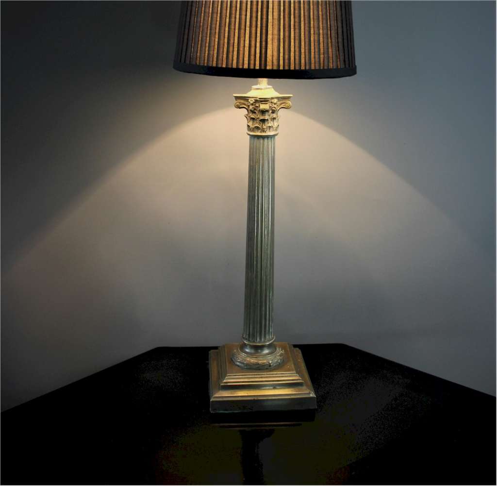 Antique Corinthian lamp base.