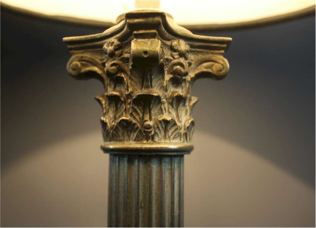 Antique Corinthian lamp base.