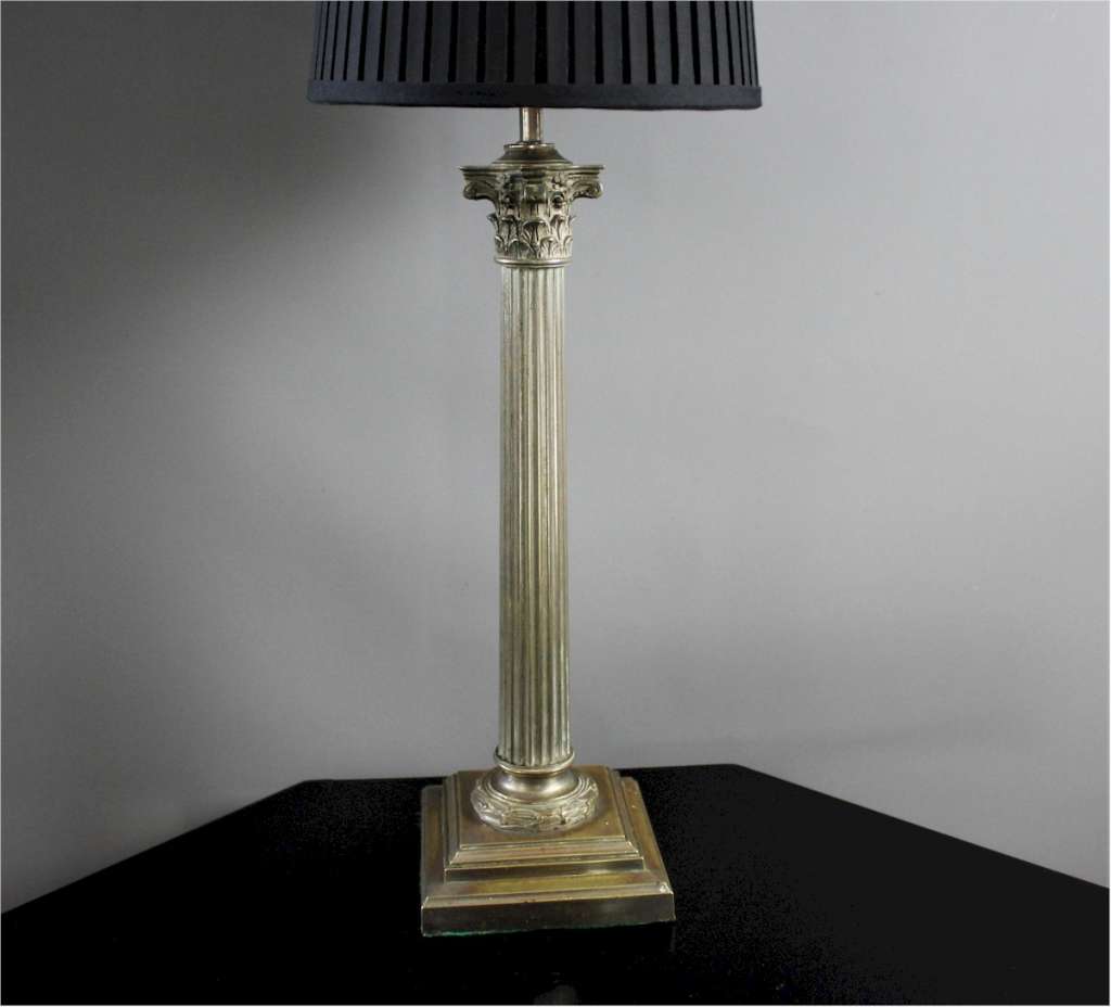 Antique Corinthian lamp base.