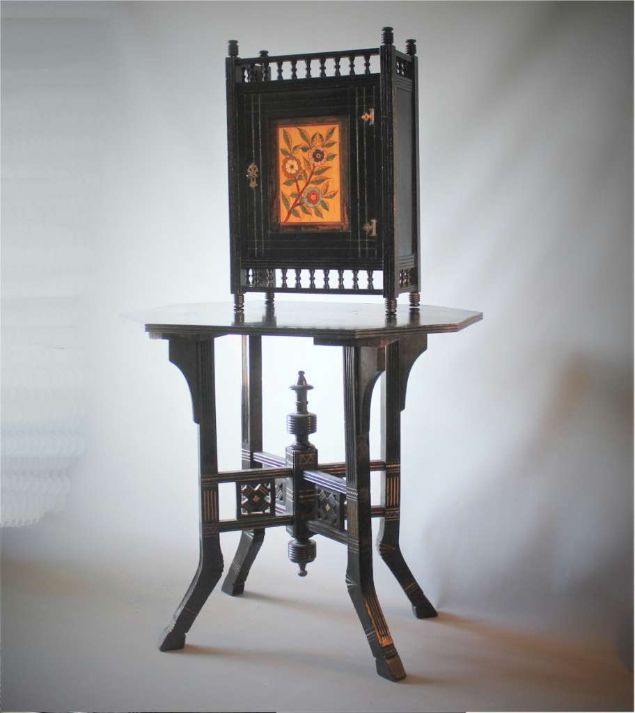 Aesthetic Ebonised wall cabinet with coloured front panel