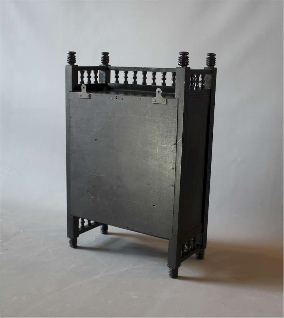 Aesthetic Ebonised wall cabinet with coloured front panel