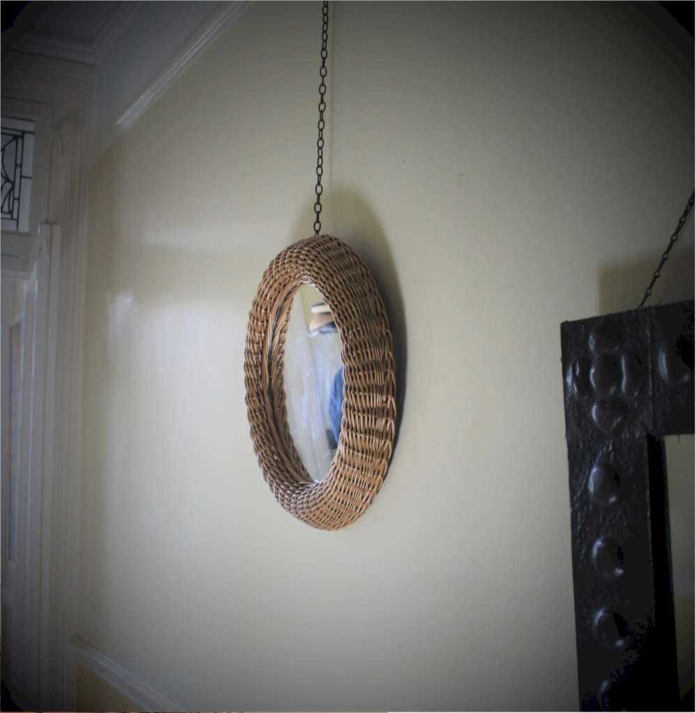 Mid-Century circular wicker mirror in the style of Albini.