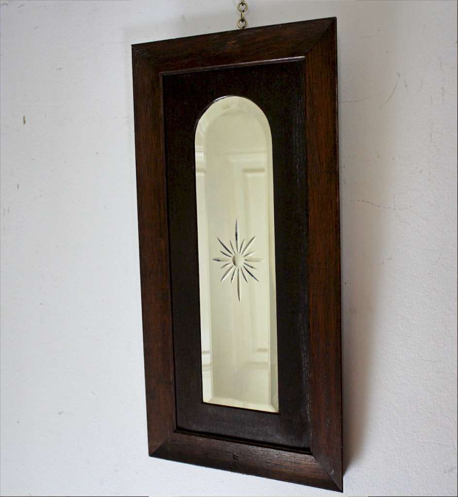 Edwardian oak framed arched mirror