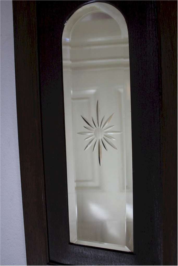 Edwardian oak framed arched mirror