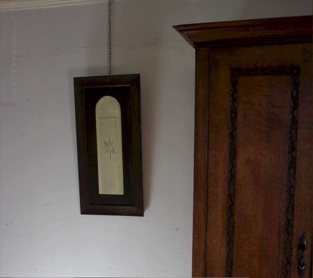 Edwardian oak framed arched mirror