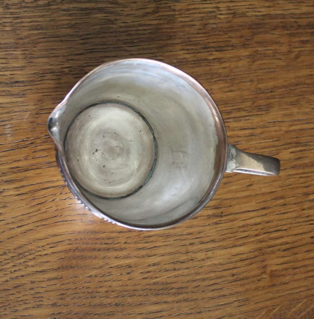 W.A.S Benson silver plated on copper milk jug