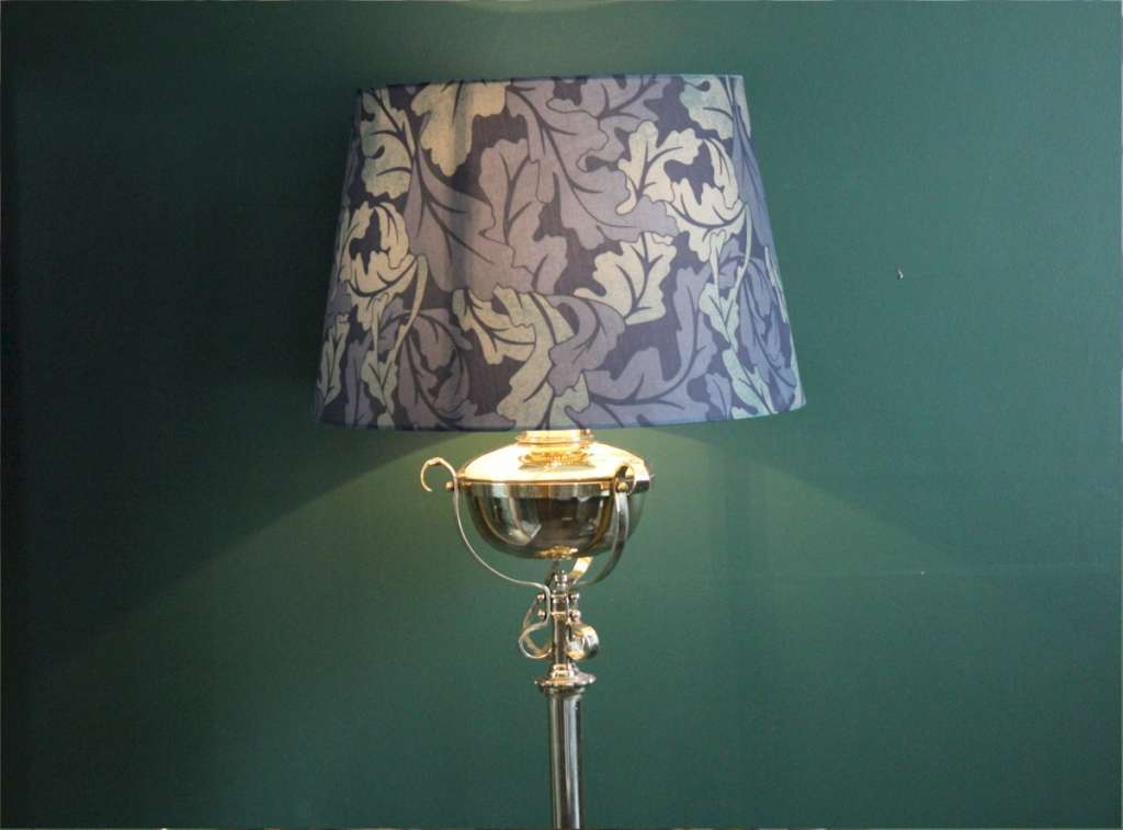 Victorian brass standard lamp in the manner of Hinks and Benson