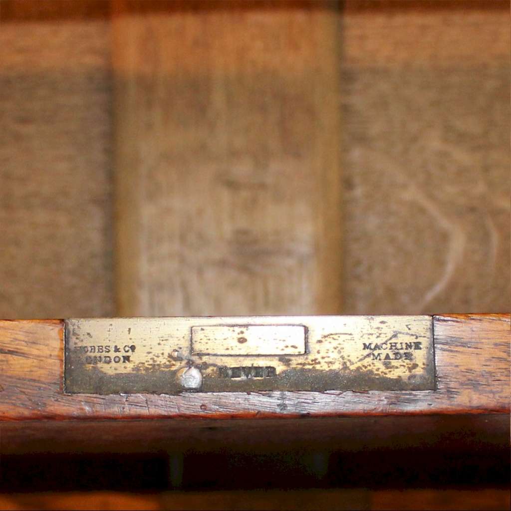 Antique campaign chest of drawers in solid oak