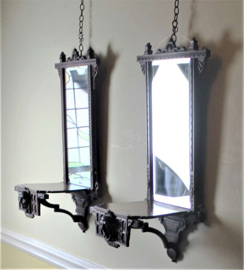 Pair of Aesthetic Movement mahogany mirrored back wall brackets