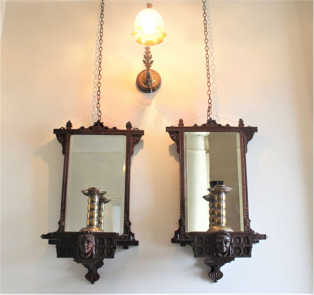 Pair of Aesthetic Movement mahogany mirrored back wall brackets