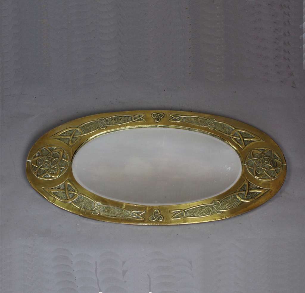 Arts and Crafts oval brass mirror with Celtic Knot design