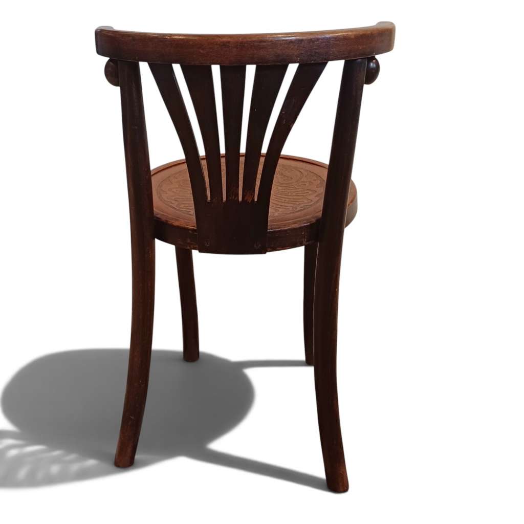 A Bentwood Childs chair with curved back