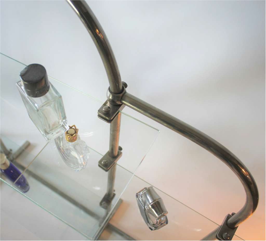 Art Deco chrome shop display stand with adjustable glass shelves