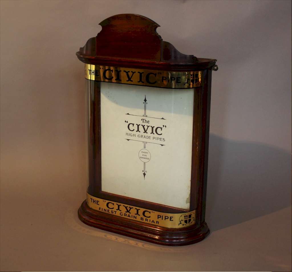 Lovely small bow fronted Civic pipe display cabinet