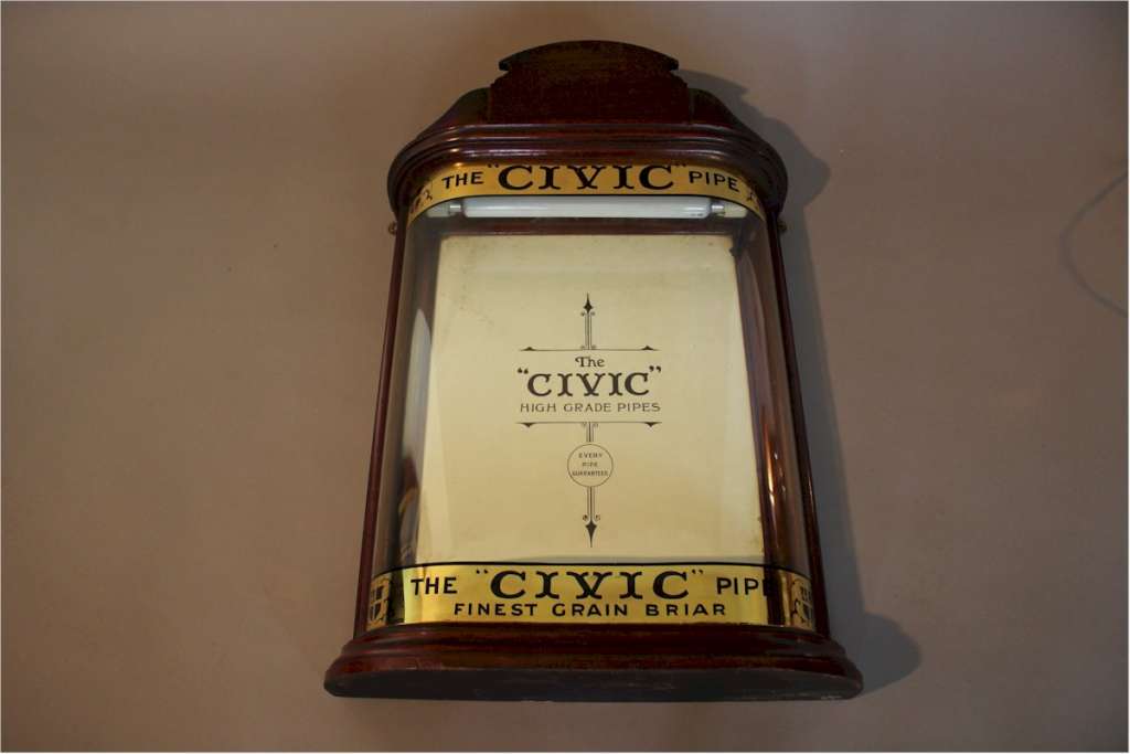 Lovely small bow fronted Civic pipe display cabinet