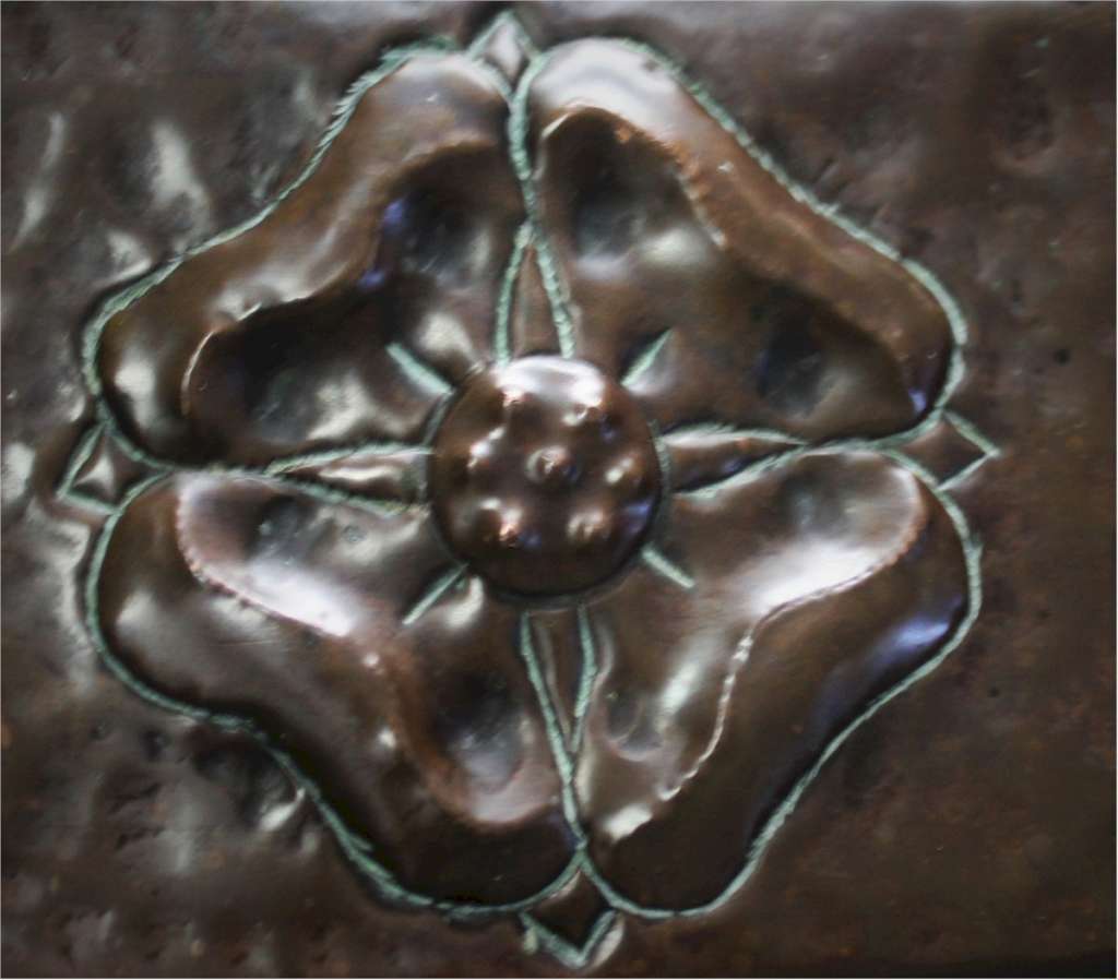 Arts and Crafts copper mirror