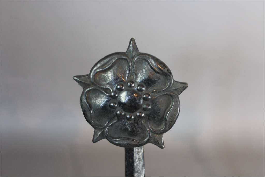 Arts and Crafts pair of iron fire dogs