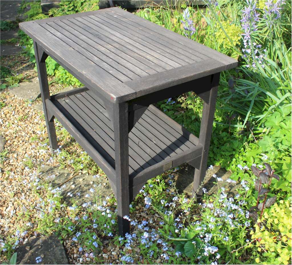 Teak garden table by Hughes Bolckow