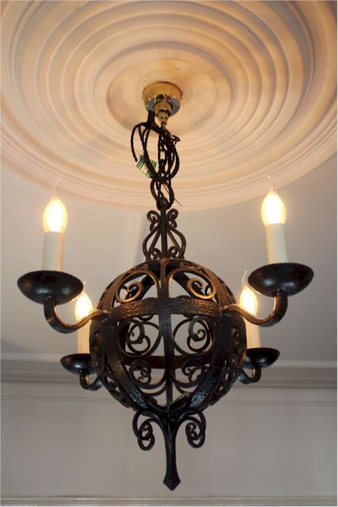 Arts and crafts iron hanging four branch ceiling lamp .c1910