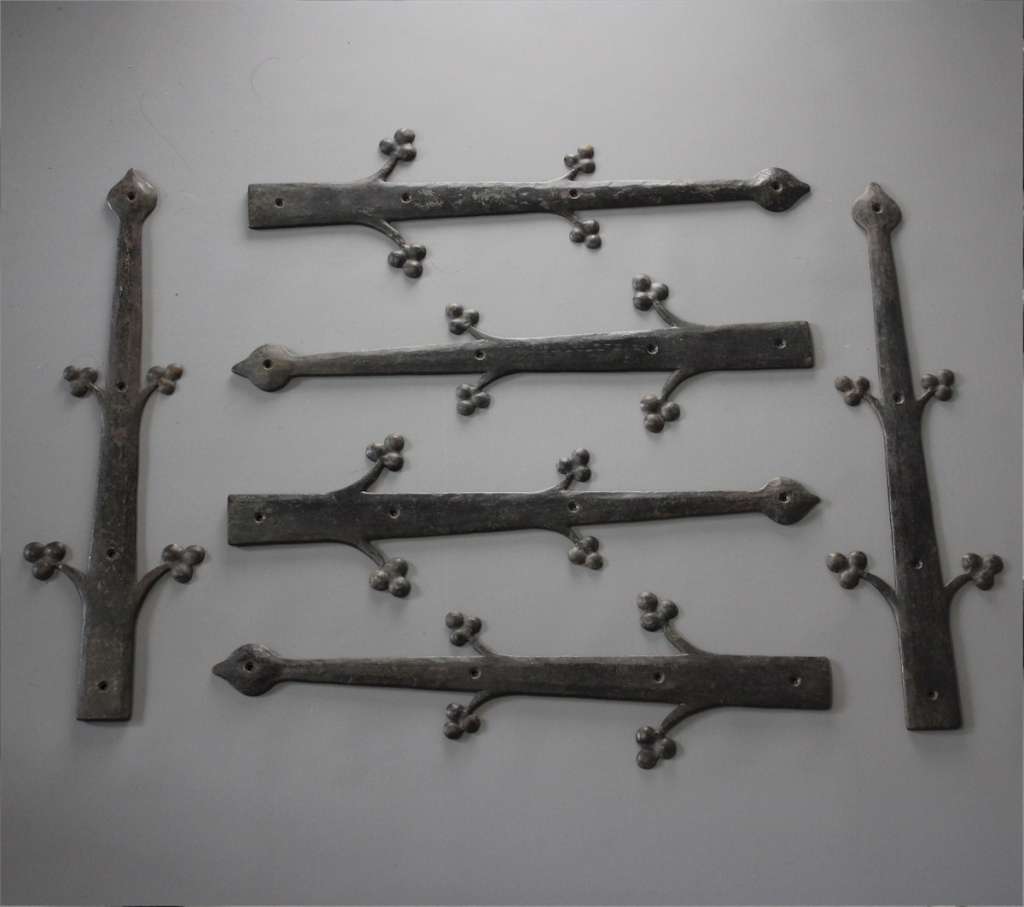 Set of six arts and crafts iron straps
