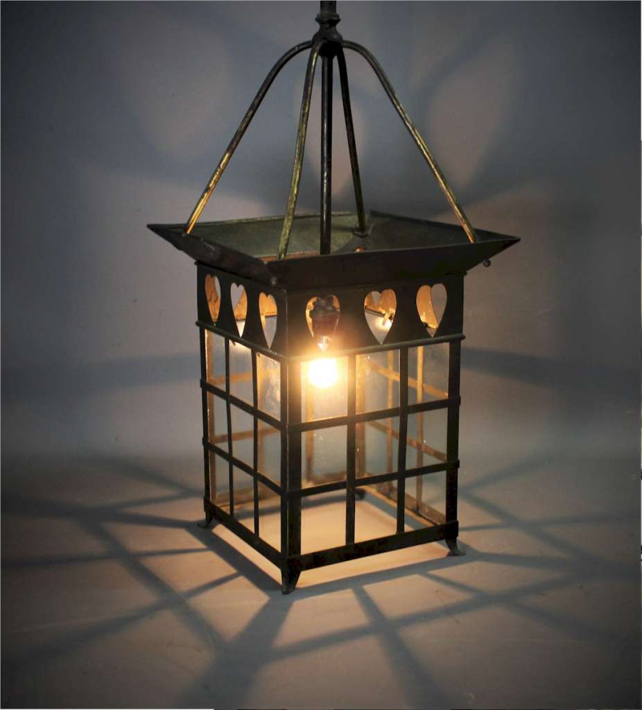 arts and crafts brass lantern with Voysey style pierced hearts