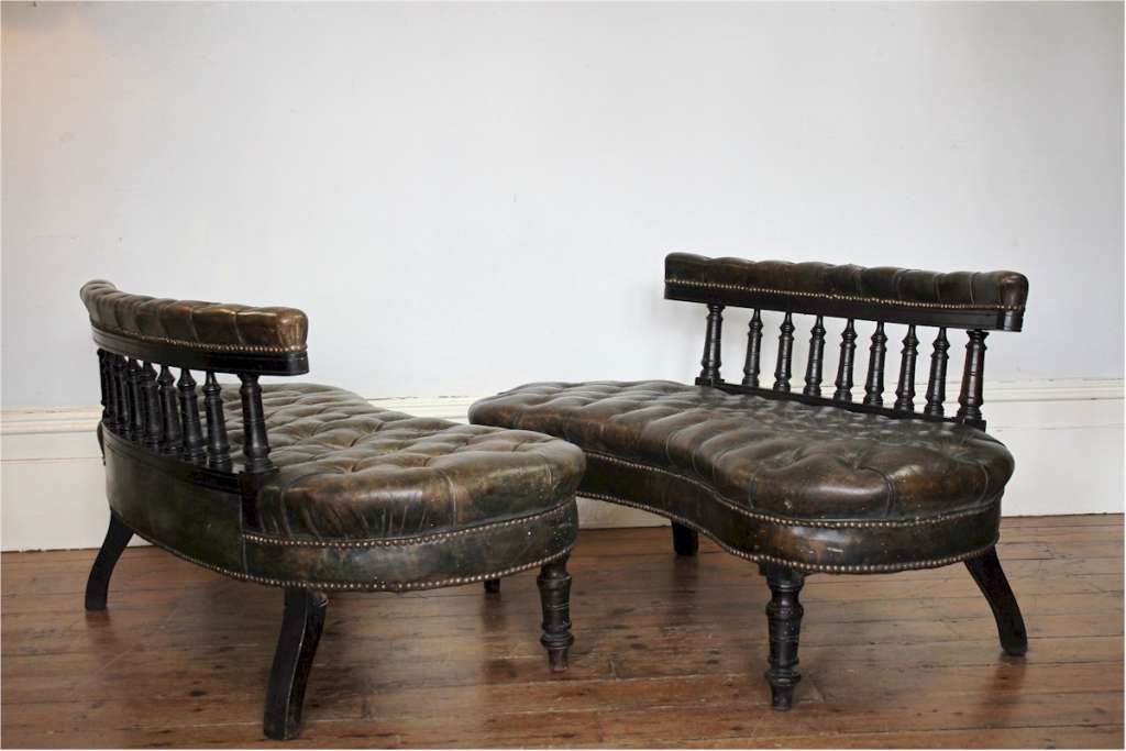 Unusual pair of Victorian leather buttoned back settees