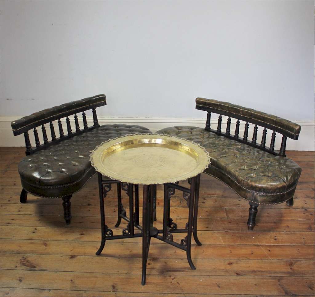 Unusual pair of Victorian leather buttoned back settees
