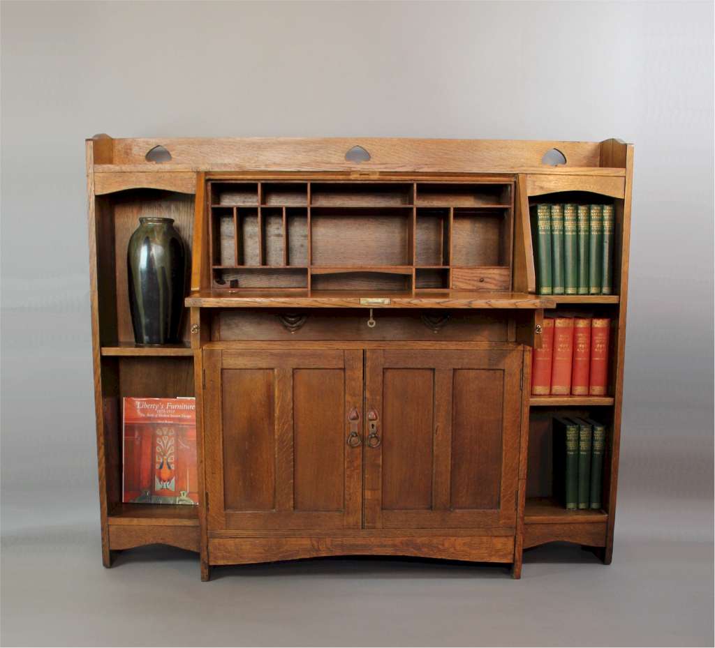 Liberty & Co arts and crafts oak bureau bookcase with pierced heart cut