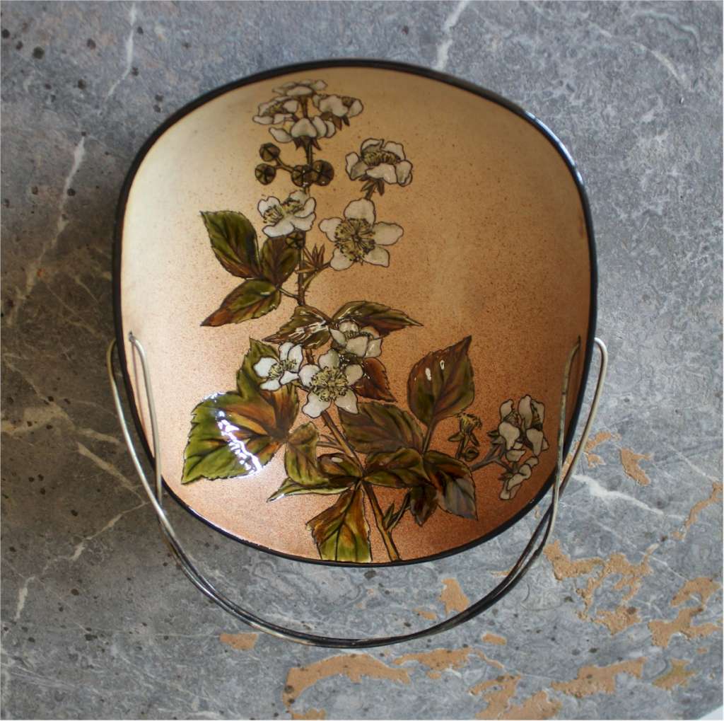 Linthorpe floral dish designed by Christopher Dresser