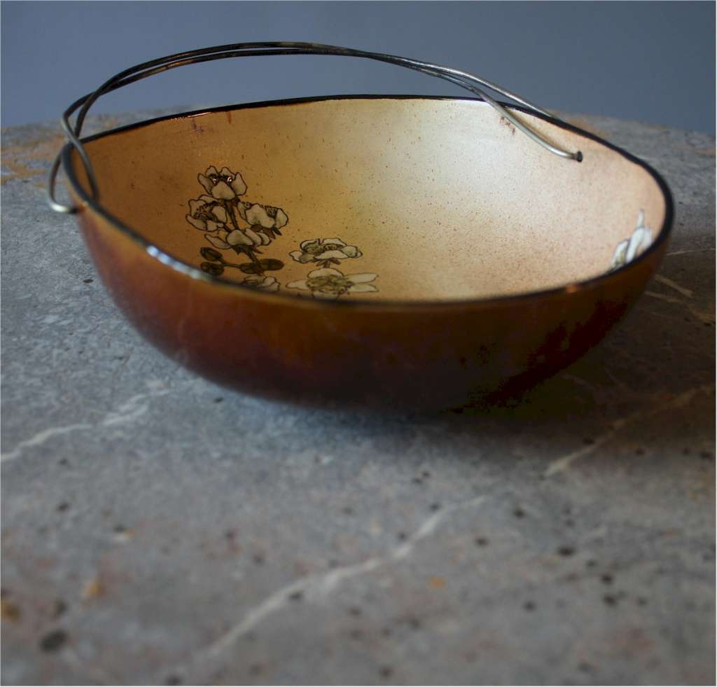 Linthorpe floral dish designed by Christopher Dresser