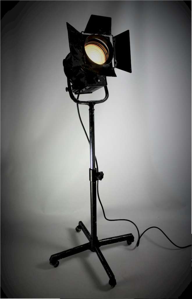 Mole-Richardson spot flood theatre lamp on stand.