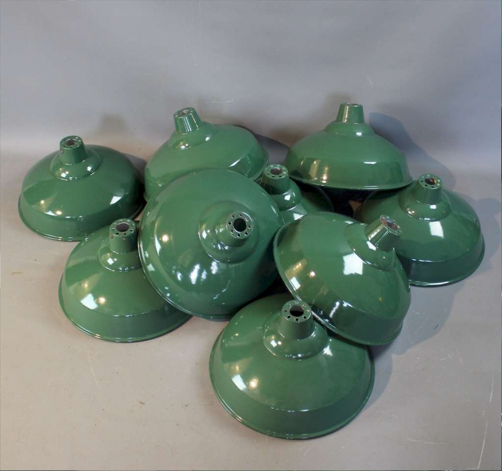 Quantity of original green enamelled industrial shades.
