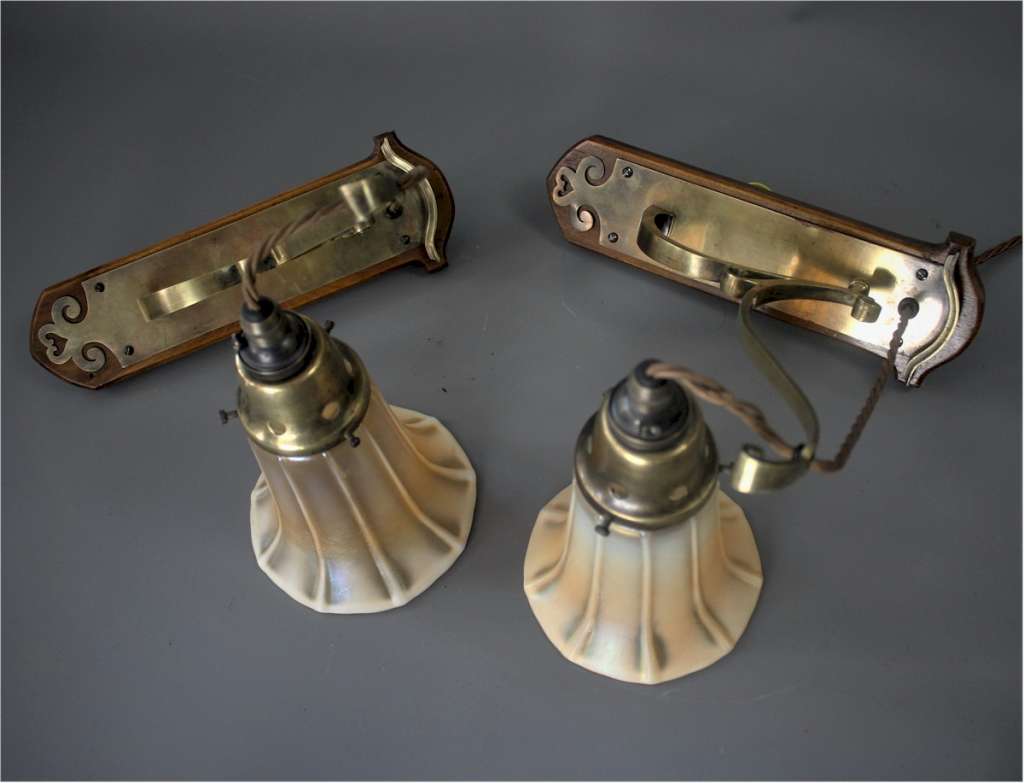 Pair of arts and crafts wall lights.