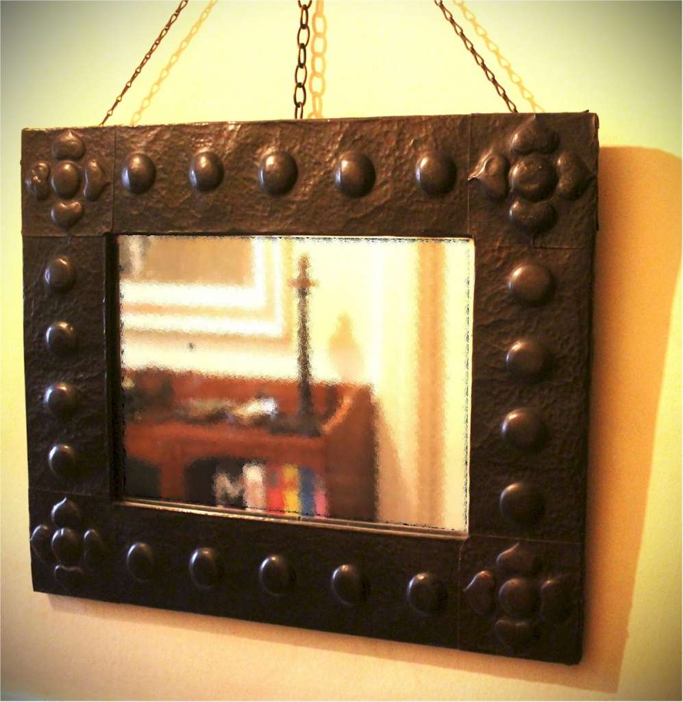 Arts and Crafts patinated copper framed mirror