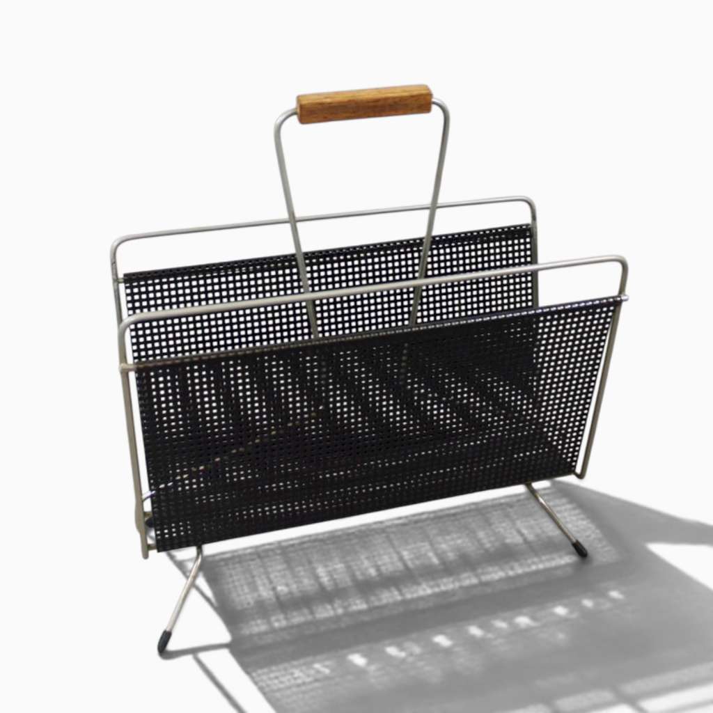 Perforated magazine rack from the 1950's