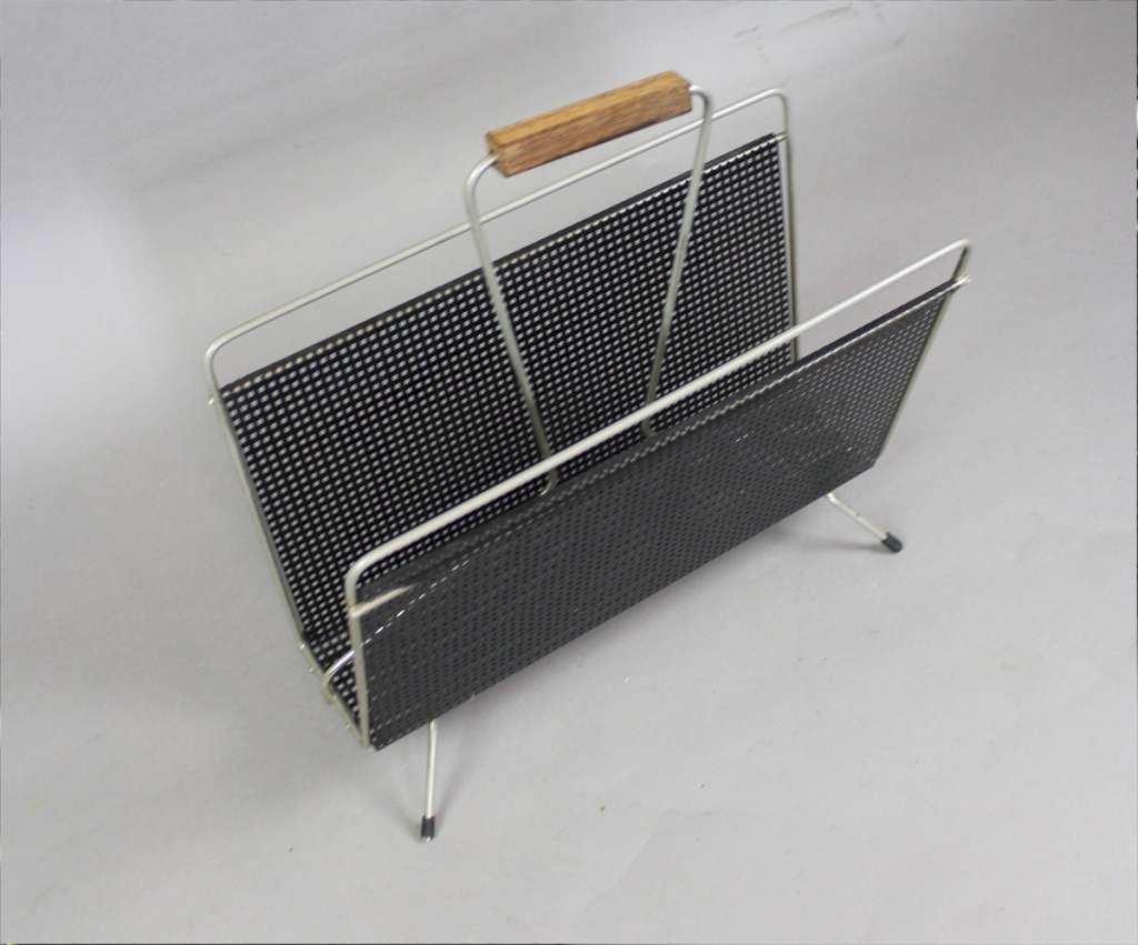 Perforated magazine rack from the 1950's
