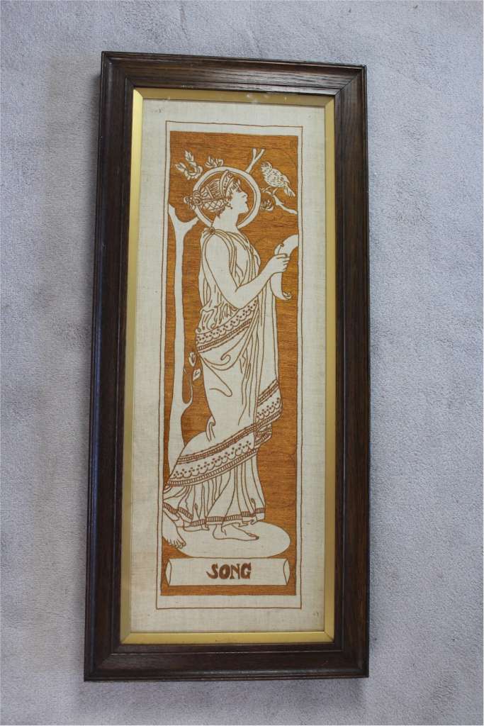 Three art nouveau embroidered panels in oak frames after Selwyn Image